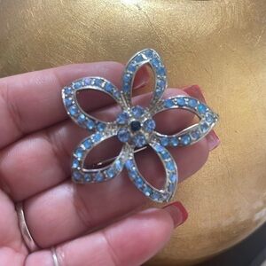 Blue rhinestone flower brooch
